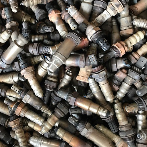 Image of scrap spark plugs in a pile